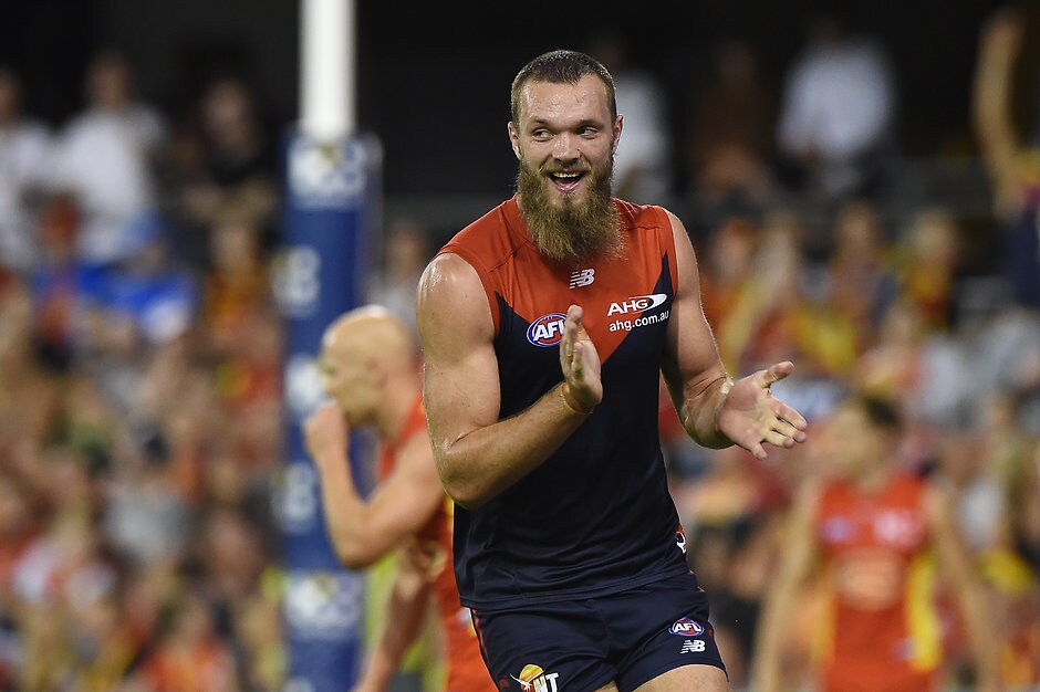 AFL 2016 Rd 07 - Gold Coast v Melbourne GOLD COAST, AUSTRALIA - MAY 7: Max Gawn of the Demons celebrates kicking a goal during the 2016 AFL Round 07 match between the Gold Coast Suns and the Melbourne Demons at Metricon Stadium, Gold Coast on May 7, 2016. (Photo by Matt Roberts/AFL Media)